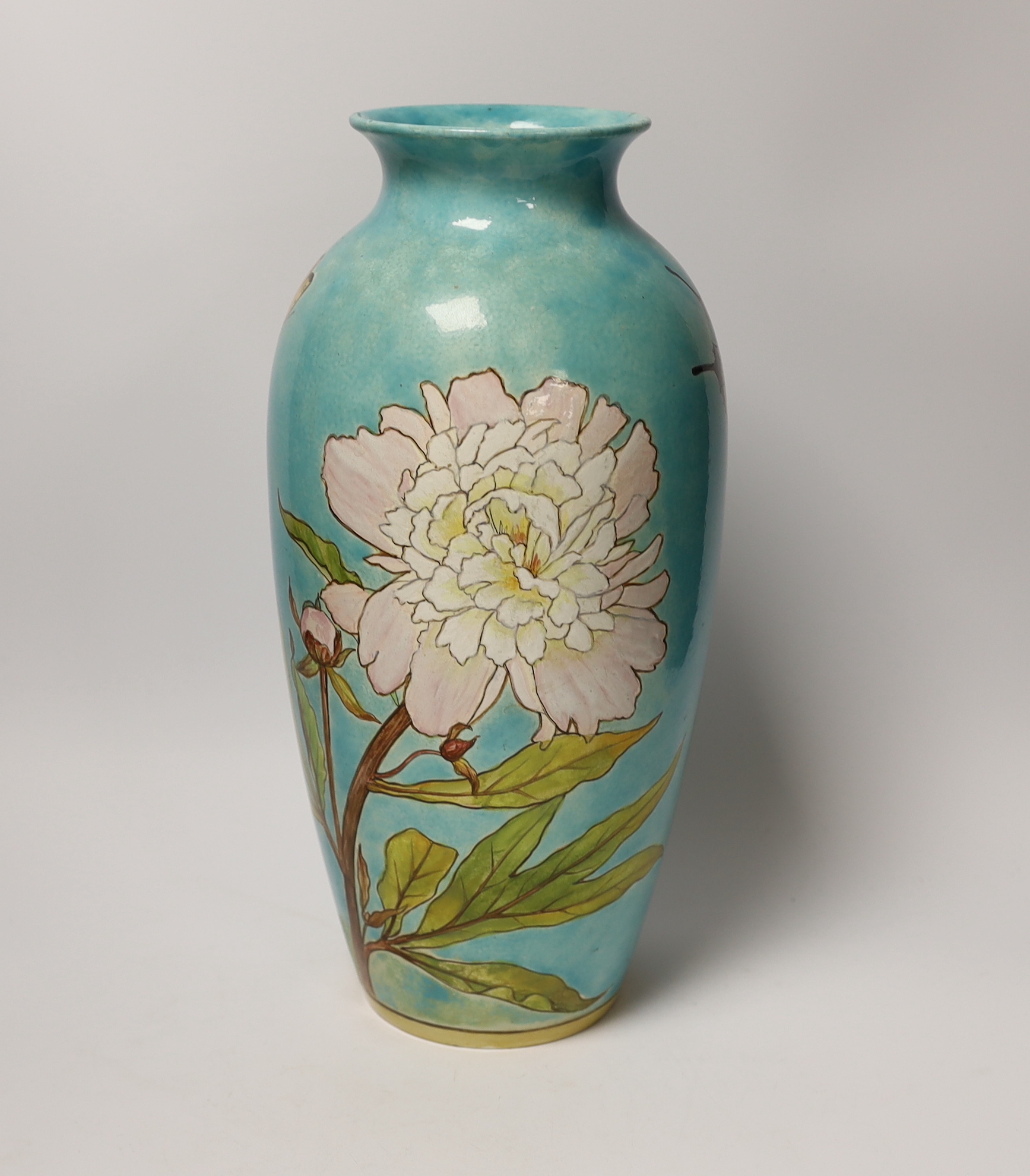 A Minton Art Pottery Studio Kensington Gore (1871-1875) vase, decorated with flowers and a butterfly, 35.5cm